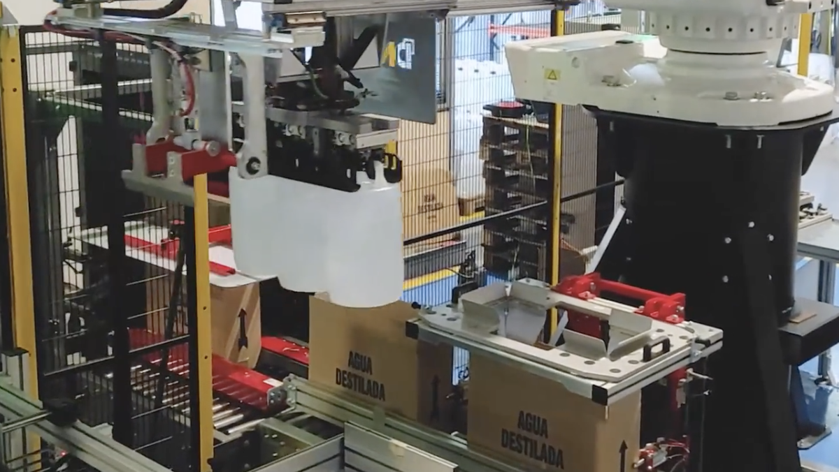 Robotized packing and palletizing cell